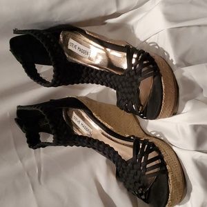 Steve Madden wedge sandal. Wedge is neutral . Top is black macrame in style.